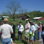 Mike Tabor gives tour of his farm to local patrons.